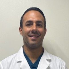 Dr. Charles Frías Román